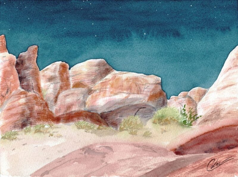 Aquarelle paysage représentant un canyon de terre rouge, sous un ciel bleu sombre réalisée par Christelle Lachambre artiste-peintre