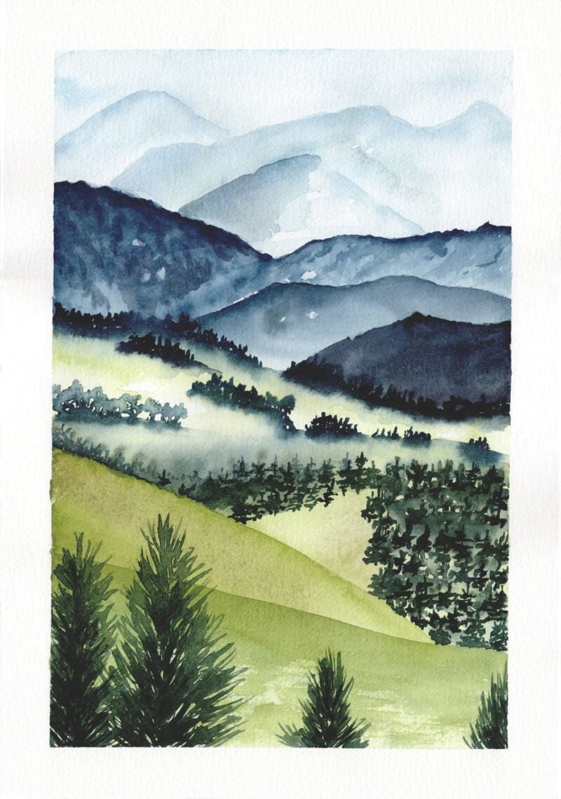 Aquarelle paysage représentant un paysage de vallons et de forêts sous une légère brume, avec des montagne en arrière-plan, réalisée par Christelle Lachambre artiste-peintre