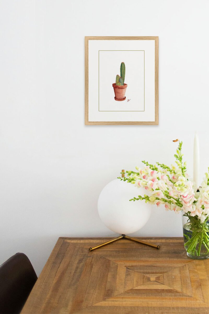 aquarelle moderne Cactus en pot n°2 en décoration intérieure sur le mur blanc d'une table de salle à manger